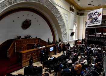 Venezuelan opposition leader and self-proclaimed interim president Juan Guaido (C at left) conducts a session of the National Assembly in Caracas on April 9, 2019. - The Permanent Council of the Organization of American States (OAS) will hold a special meeting on Tuesday to consider if it accepts Guaidos envoy as Venezuelas special  representative. (Photo by Federico Parra / AFP)        (Photo credit should read FEDERICO PARRA/AFP/Getty Images)