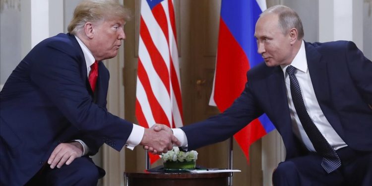 U S  President Donald Trump  left  and Russian President Vladimir Putin  right  shake hand at the beginning of a meeting at the Presidential Palace in Helsinki  Finland  Monday  July 16  2018   AP Photo Pablo Martinez Monsivais