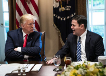 President Donald Trump speaks with Arizona Gov. Doug Ducey (R) as they participate in a working lunch with governors at the White House on June 13, 2019. MUST CREDIT: Washington Post photo by Jabin Botsford.