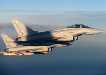 FILE PHOTO: British Royal Air Force's Typhoon Eurofighter jets demonstrate the interception of a Belgian air force transport plane as they fly over Britain, January 14, 2020. Picture taken January 14, 2020. REUTERS/Johanna Geron/File Photo