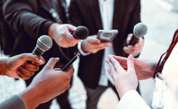 Female Leading Interview With Journalists Outside