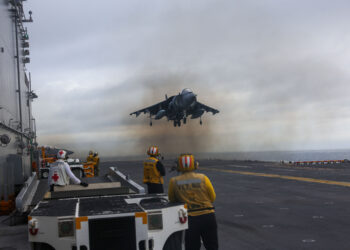 ATLANTIC OCEAN (Aug. 24, 2025) An AV-8B Harrier, assigned to the “Thunder Chickens” of Marine Medium Tiltrotor Squadron (VMM) 263 (Reinforced), lands on the flight deck of the Wasp-class amphibious assault ship USS Iwo Jima (LHD 7) during flight operations. The Iwo Jima Amphibious Ready Group (IWO ARG) and embarked 22nd Marine Expeditionary Unit-Special Operations Capable (MEU (SOC)) is underway in the Atlantic Ocean during a regularly scheduled deployment. The Iwo ARG-22nd MEU (SOC) is America’s 9-1-1 force-lethal, capable, and adaptable-ready to respond to contingency missions around the globe. This force operates 24/7, reassuring our Allies and partners; deterring our adversaries; keeping the world’s ocean free and open in accordance with international standards; and projecting power on a global scale through sustained operations at sea. (U.S. Navy Photo by Mass Communications Specialist Logan Goins)