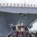 NORFOLK, Va. (Aug. 14, 2025) - Sailors and Marines man the rails aboard the Wasp-class amphibious assault ship USS Iwo Jima (LHD 7) as it departs Naval Station Norfolk for a regularly scheduled deployment. Sailors and Marines of the Iwo Jima Amphibious Ready Group (IWO ARG) - 22nd Marine Expeditionary Unit (MEU) Special Operations Capable (SOC) departed Norfolk and Camp Lejeune, North Carolina after completing a comprehensive, nine-month training program. (U.S. Navy photo by Mass Communication Specialist 1st Class Clay Whaley)