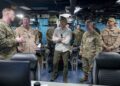 Secretary of War Pete Hegseth and Chairman of the Joint Chiefs of Staff Gen. Dan Caine meet with Navy leadership aboard the USS Iwo Jima in the Caribbean Sea, September 8, 2025. (DoW photo by Benjamin Applebaum)